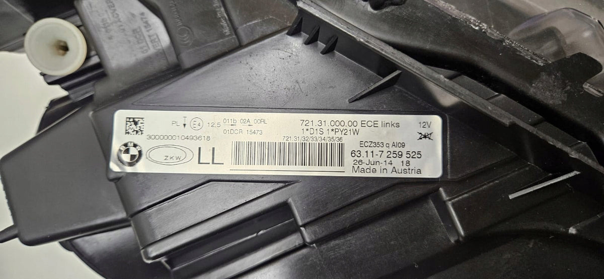 Venstre lygtes originale BMW/ZKW-mærkat: 63117259525, 26. juni 2014