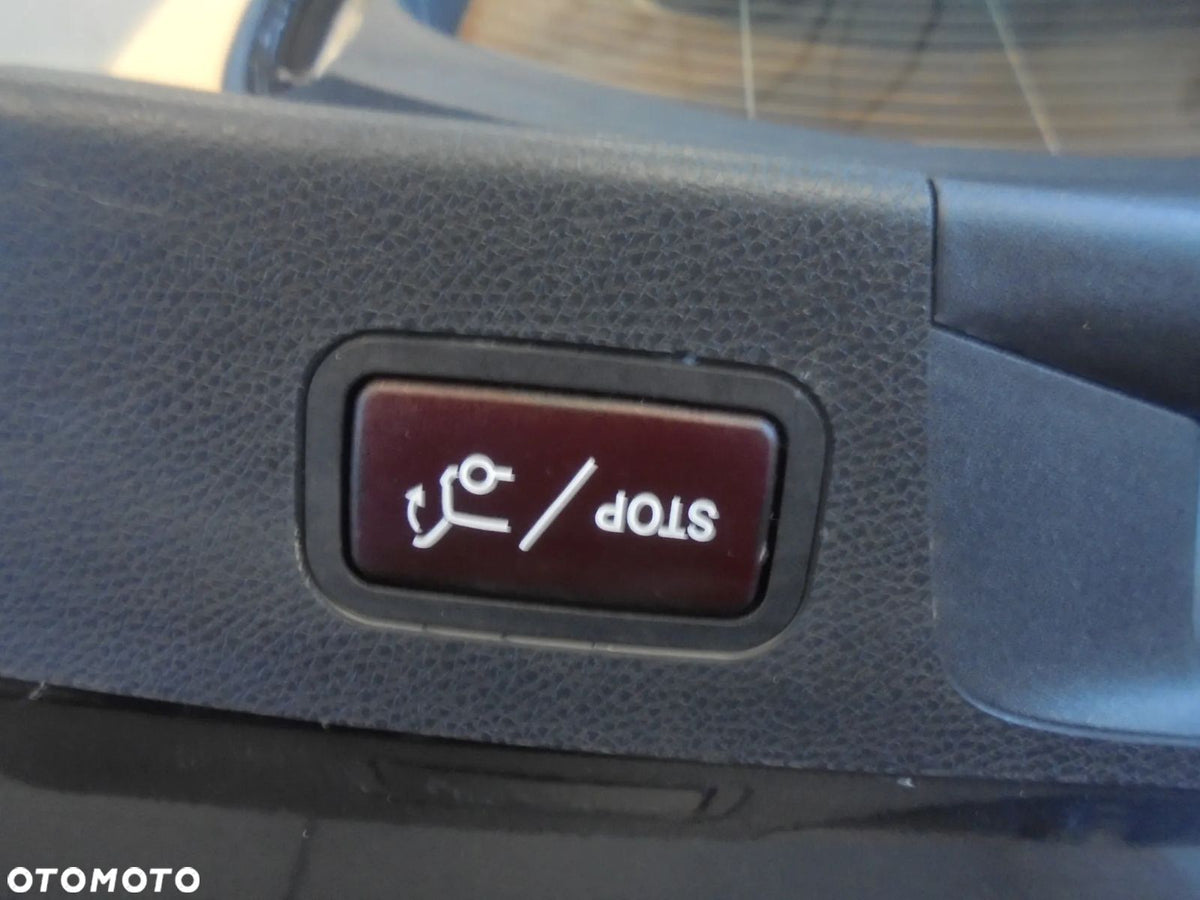 Betjeningsknap med åbne/lukke/STOP-symbol; funktion ikke testet
