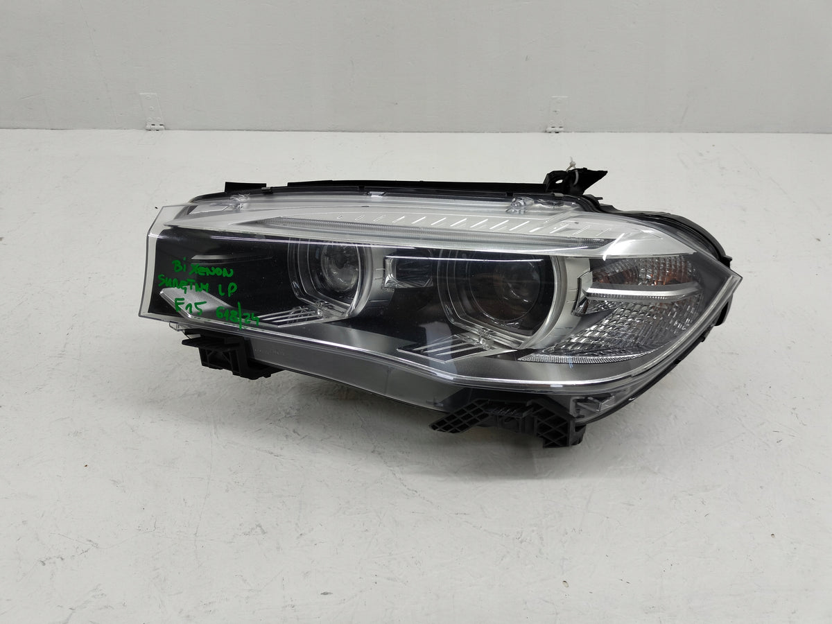 BMW F15 F16 venstre adaptiv bi-xenon-forlygte 7399115 frontfoto med standmarkeringer