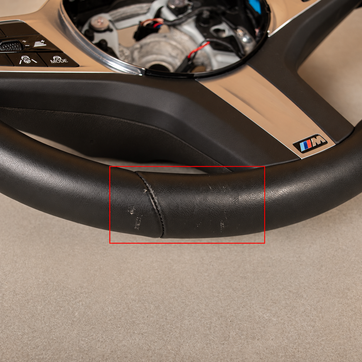 BMW G05 rat – nærbillede af læderslid, folder og skrammer